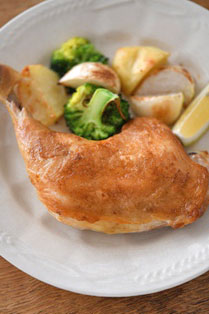 ローストチキン（骨付きもも肉で）の写真